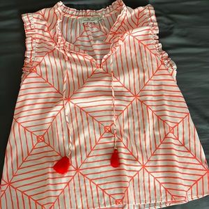 Bright white and orange tank top with tassels